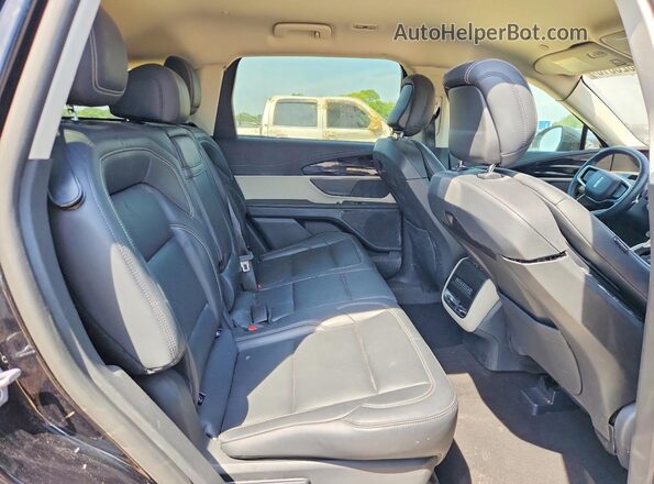 5LMPJ8J40SJ890940 2025 LINCOLN NAUTILUS Черный Вид задней части салона
