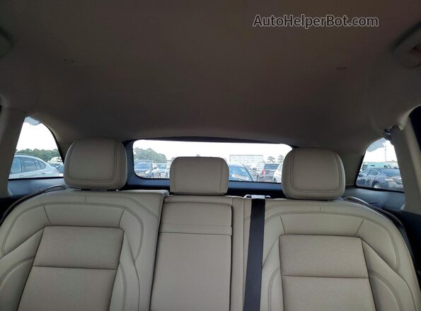 5LMPJ8JA2SJ969855 2025 LINCOLN NAUTILUS Maroon Rear seats view