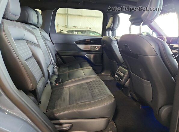 5LMPJ8K44SJ932864 2025 LINCOLN NAUTILUS Blue Вид задньої частини салону