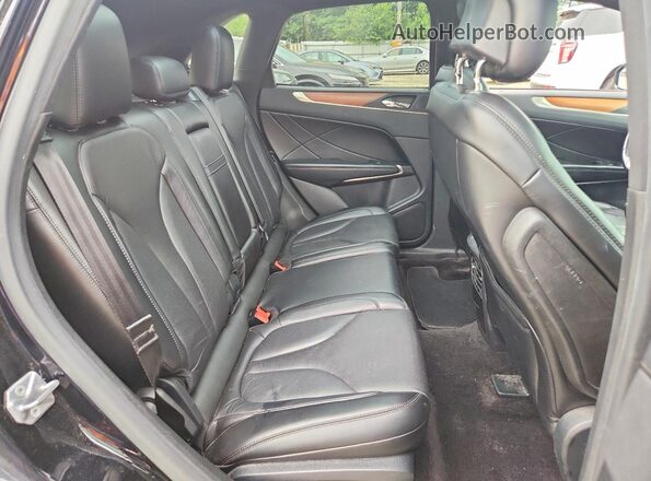 5LMTJ3DH7HUL49312 2017 LINCOLN MKC Черный Вид задней части салона