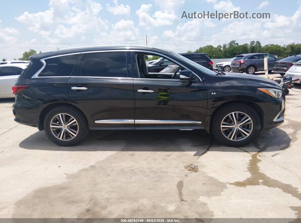 5N1AL0MNXGC517375 2016 INFINITI QX60 Black Rear interior view