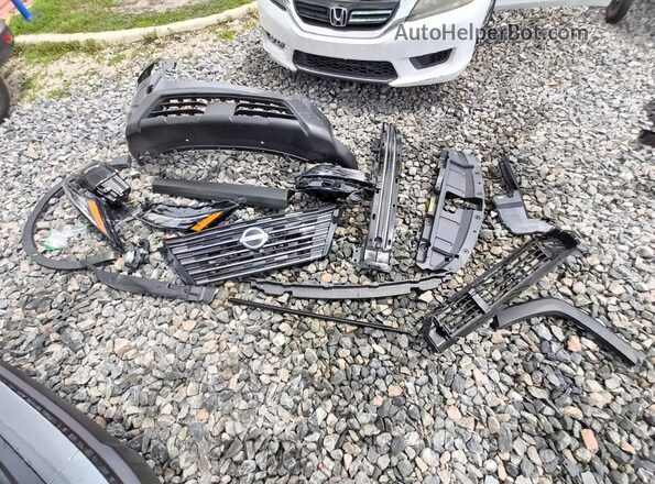 5N1BT3BB8TC823385 2026 NISSAN ROGUE Charcoal Vista de la etiqueta del VIN