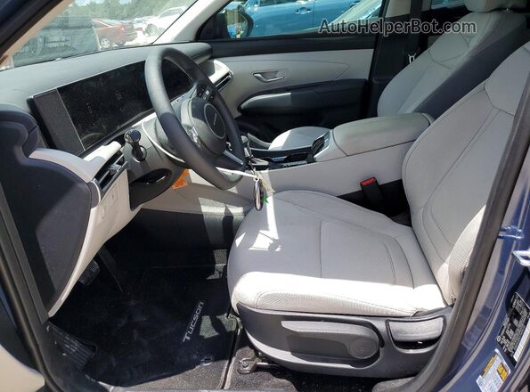5NMJA3DE5TH695735 2026 HYUNDAI TUCSON Blue Widok wnętrza z przodu