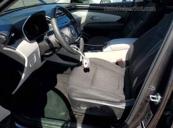 5NMJB3AE1PH229534 2023 HYUNDAI TUCSON Charcoal Front interior view