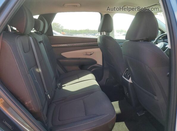 5NMJB3AE1PH229534 2023 HYUNDAI TUCSON Charcoal Rear interior view