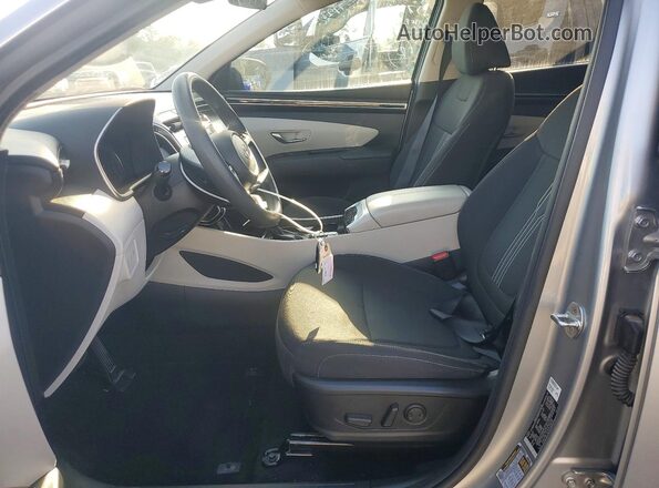 5NMJBCAE4PH218298 2023 HYUNDAI TUCSON Silver Вид салону спереду