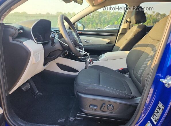 5NMJBCDE5RH354955 2024 HYUNDAI TUCSON Blue Front interior view