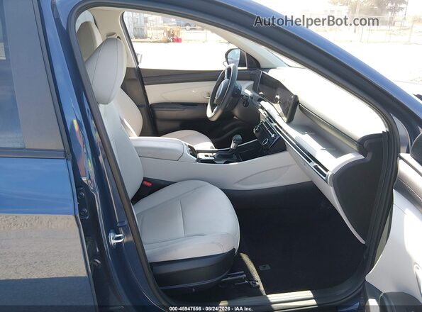 5NMJBCDEXSH579717 2025 HYUNDAI TUCSON Синий Вид салона спереди