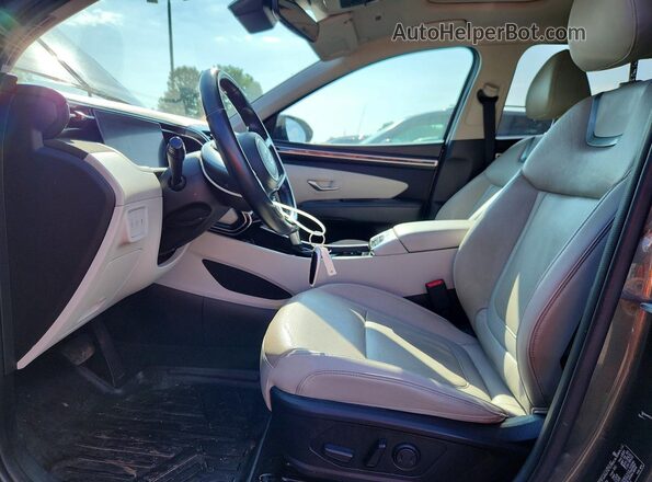 5NMJCCAE0NH043039 2022 HYUNDAI TUCSON Gray Vista interior delantera