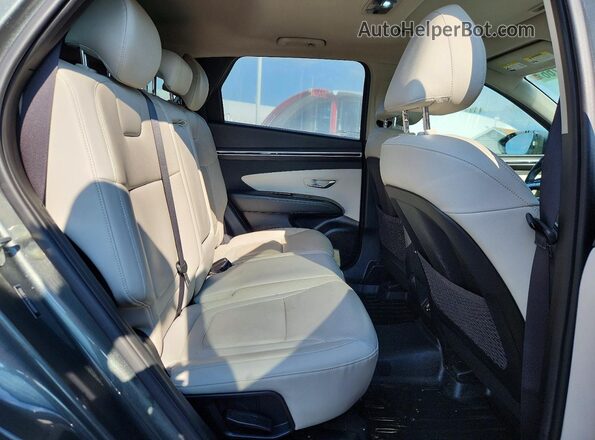 5NMJCCAE0NH043039 2022 HYUNDAI TUCSON Gray Vista interior trasera