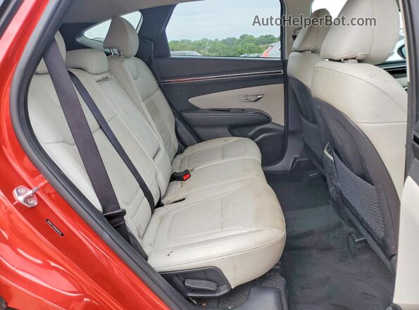 5NMJCCAE9NH064570 2022 HYUNDAI TUCSON Red Rear interior view