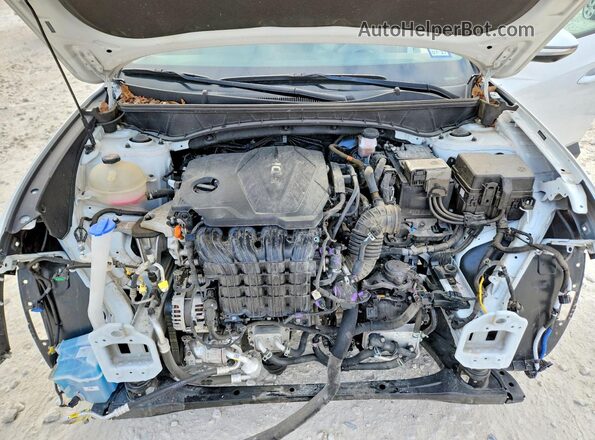 5NMJE3AE4NH031583 2022 HYUNDAI TUCSON White Սալոնի հետևի տեսք