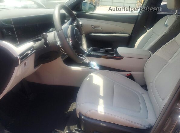5NMJECDE5SH526334 2025 HYUNDAI TUCSON Gray წინა სალონის ხედი