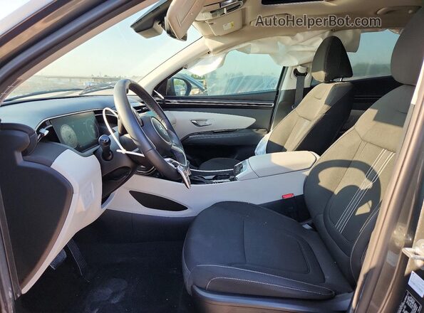 5NMJF3AEXNH028913 2022 HYUNDAI TUCSON Green Front interior view