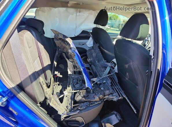 5NMJFCAE0NH107085 2022 HYUNDAI TUCSON Blue Rear interior view