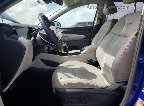 5NMJFCAE1PH206419 2023 HYUNDAI TUCSON Blue Front interior view