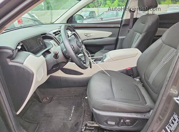 5NMJFCAE9NH096331 2022 HYUNDAI TUCSON Gray Вид салону спереду