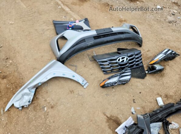 5NMJFCDE0RH362997 2024 HYUNDAI TUCSON Silver ძრავის განყოფილების ხედი
