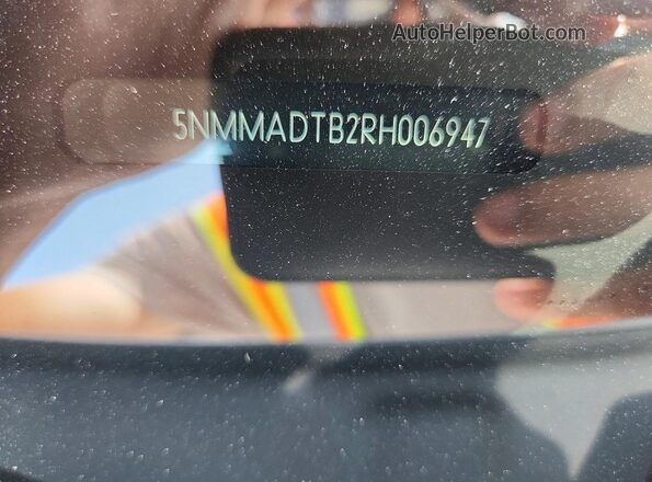 5NMMADTB2RH006947 2024 GENESIS GV70 White VIN sticker view