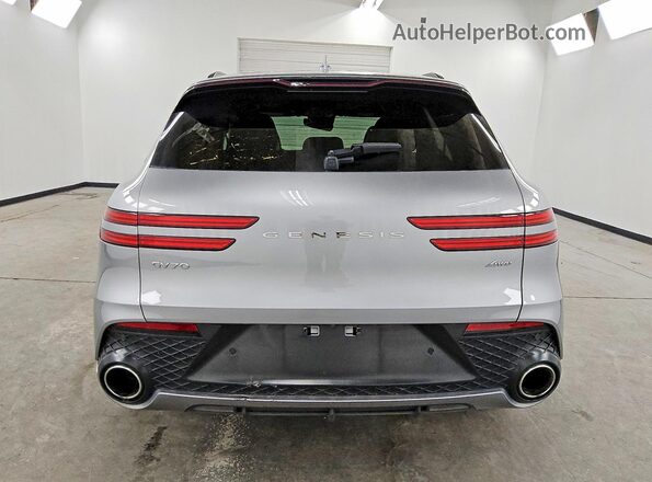 5NMMADTB5RH003525 2024 GENESIS GV70 Silver Rear view