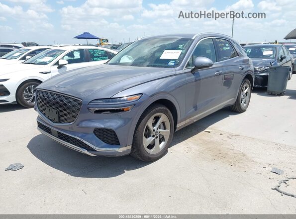 5NMMADTB6TH051087 2026 GENESIS GV70 Gray Առջևի ձախ երեք քառորդ տեսարան