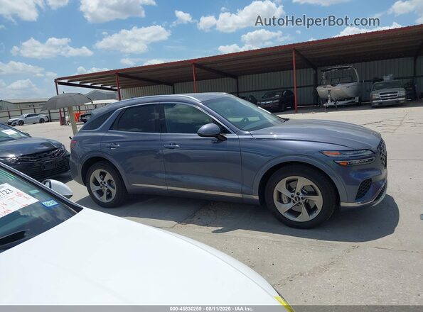 5NMMADTB6TH051087 2026 GENESIS GV70 Gray Սալոնի հետևի տեսք