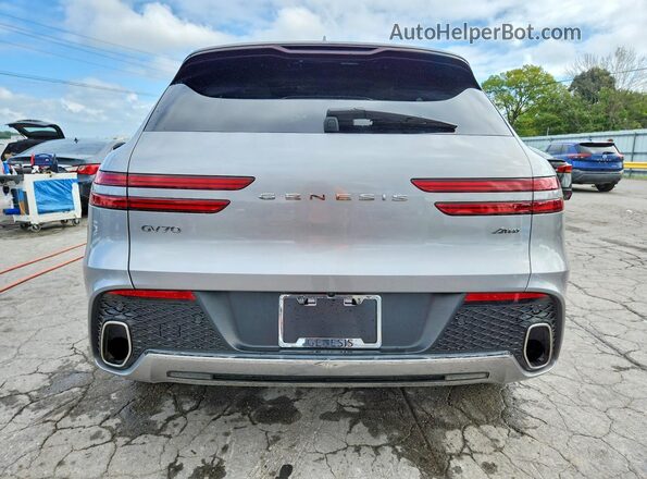 5NMMADTB7RH009570 2024 GENESIS GV70 Silver Rear view
