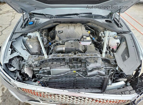 5NMMADTB7RH009570 2024 GENESIS GV70 Silver Rear interior view