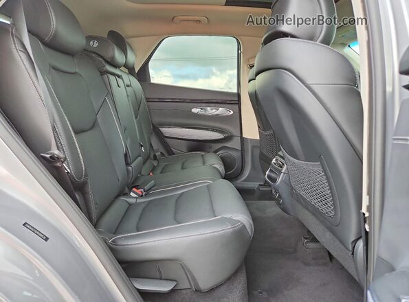 5NMMADTB7RH009570 2024 GENESIS GV70 Silver Rear seats view