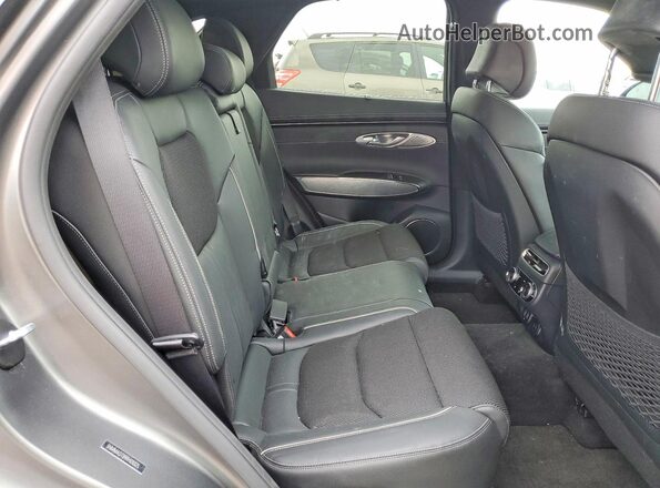 5NMMADTB9RH010025 2024 GENESIS GV70 Black Rear interior view