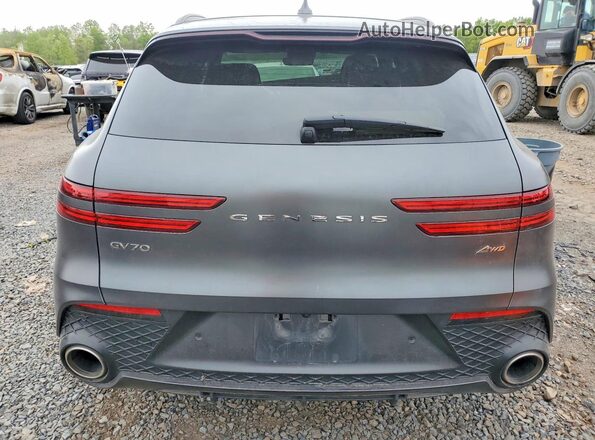 5NMMADTB9RH010025 2024 GENESIS GV70 Black Rear view