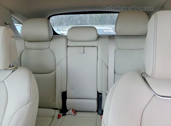 5NMMADTBXSH027065 2025 GENESIS GV70 Red Rear seats view