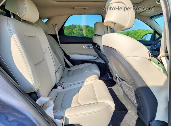 5NMMBDTB9TH055972 2026 GENESIS GV70 Blue Vista interior trasera