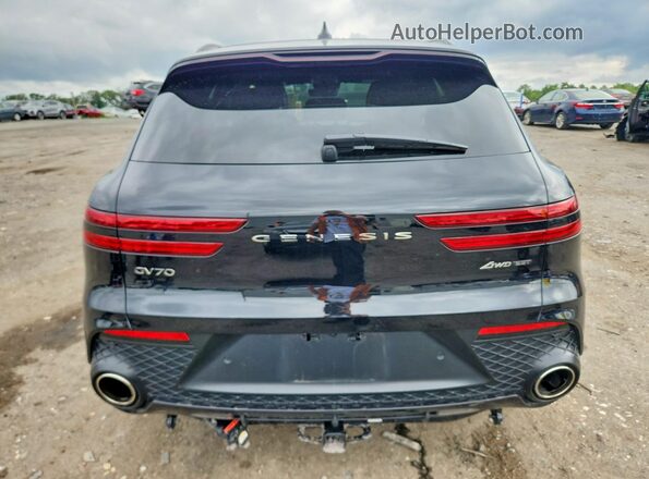 5NMMCDTC0RH013799 2024 GENESIS GV70 Black Rear view