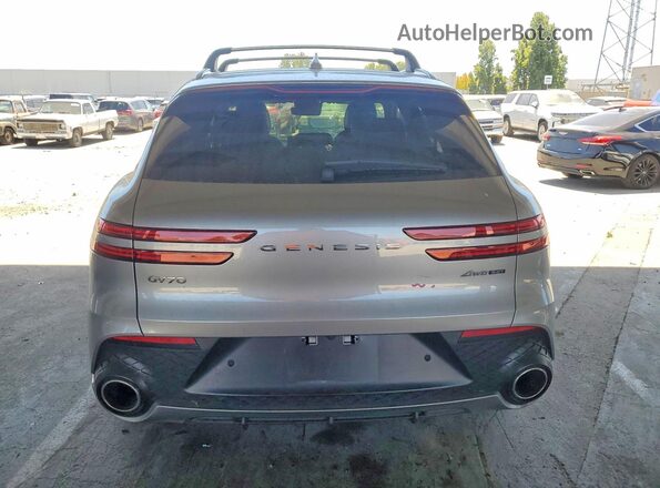 5NMMCDTC8RH014859 2024 GENESIS GV70 Silver Rear view