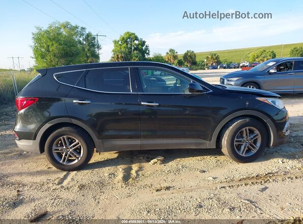 5NMZT3LB2JH095921 2018 HYUNDAI SANTA FE SPORT Black Widok wnętrza z tyłu