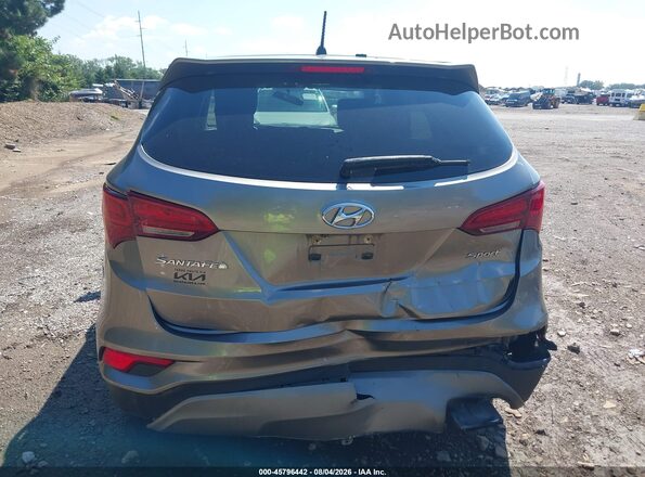 5NMZT3LB3JH077850 2018 HYUNDAI SANTA FE SPORT Желто-коричневый 