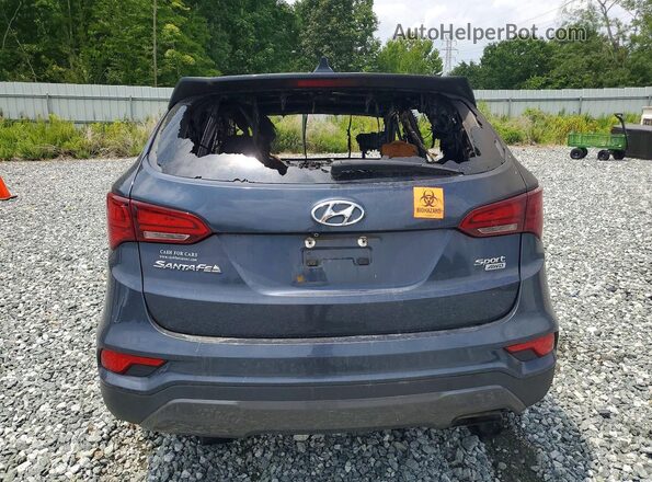 5NMZTDLB9HH045095 2017 HYUNDAI SANTA Blue Vista trasera