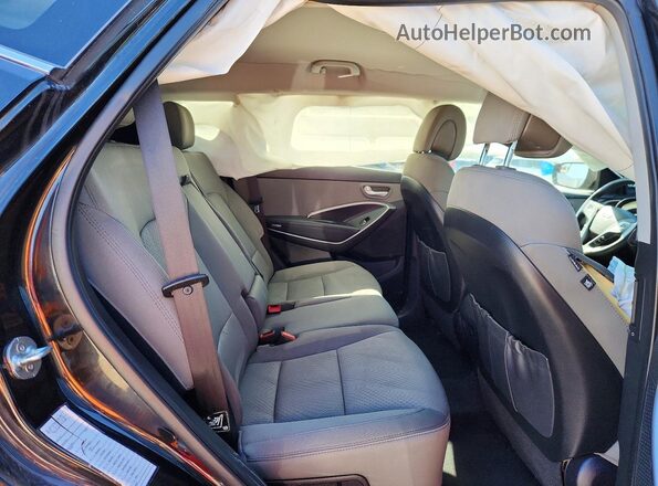 5NMZU3LB6JH057959 2018 HYUNDAI SANTA Black Vista interior trasera