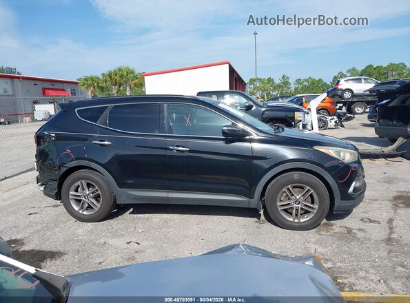5NMZU3LBXHH002702 2017 HYUNDAI SANTA FE SPORT Черный Вид задней части салона