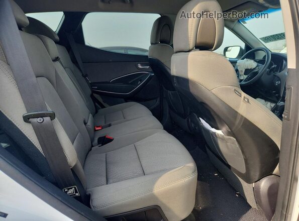 5NMZU3LBXHH050605 2017 HYUNDAI SANTA White Rear seats view