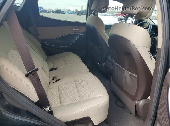 5NMZUDLB0HH011074 2017 HYUNDAI SANTA Черный Вид задней части салона