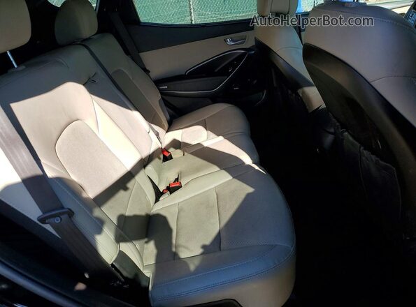 5NMZUDLB0JH066310 2018 HYUNDAI SANTA Black Vista de los asientos traseros