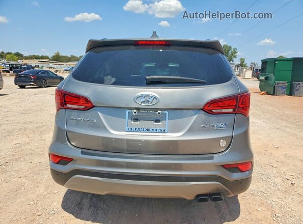 5NMZW4LAXHH044827 2017 HYUNDAI SANTA Silver Widok z tyłu