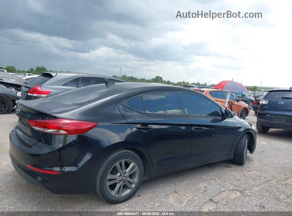 5NPD84LF4HH085683 2017 HYUNDAI ELANTRA Black Rear interior view