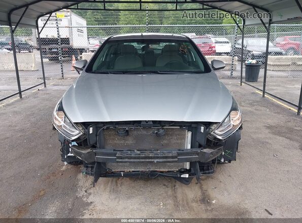 5NPE24AF0JH728013 2018 HYUNDAI SONATA Silver Rear interior view