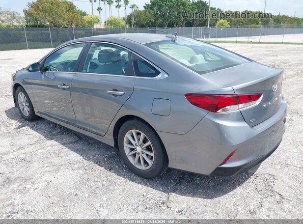 5NPE24AF0KH772322 2019 HYUNDAI SONATA Gray Trasero izquierdo