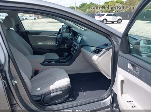 5NPE24AF0KH772322 2019 HYUNDAI SONATA Gray Vista interior delantera