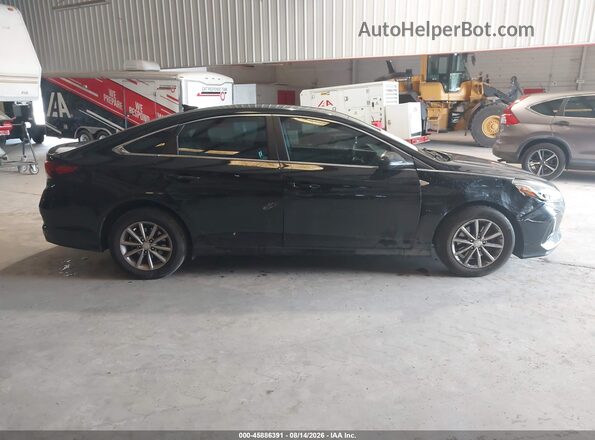5NPE24AF1JH682112 2018 HYUNDAI SONATA Black Rear interior view
