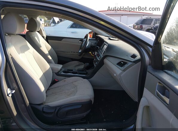 5NPE24AF4KH814877 2019 HYUNDAI SONATA Gray Widok wnętrza z przodu